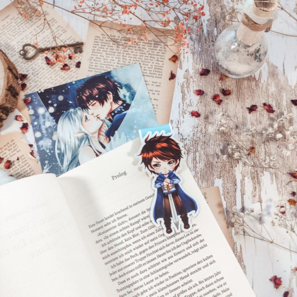 Handgefertigtes Magnetlesezeichen mit der Illustration von Ritter Leander aus Frozen Crowns von Asuka Lionera.